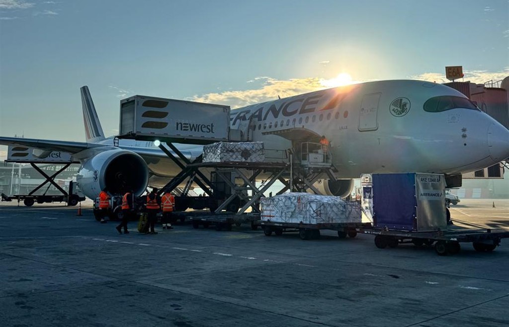 Air freight loading at dawn
